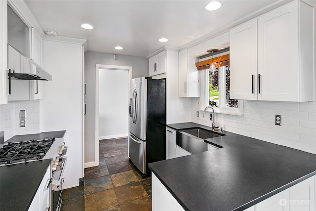 kitchen featuring stainless steel fridge with ice dispenser, white cabinets, backsplash, sink, and dark tile floors