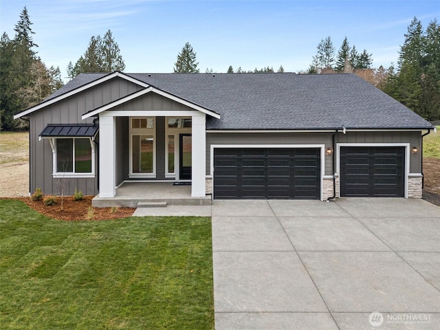 view of front of home with an attached garage, covered porch, board and batten siding, and concrete driveway