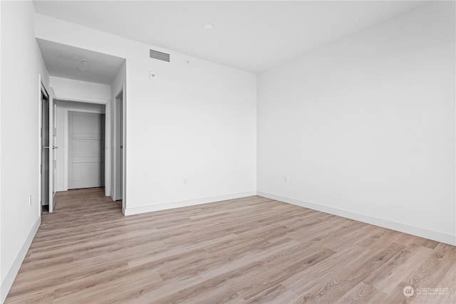 empty room featuring light hardwood / wood-style floors