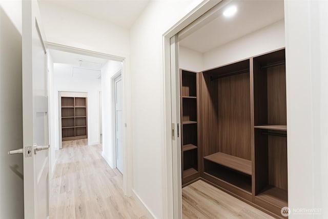 hall featuring light wood-style flooring