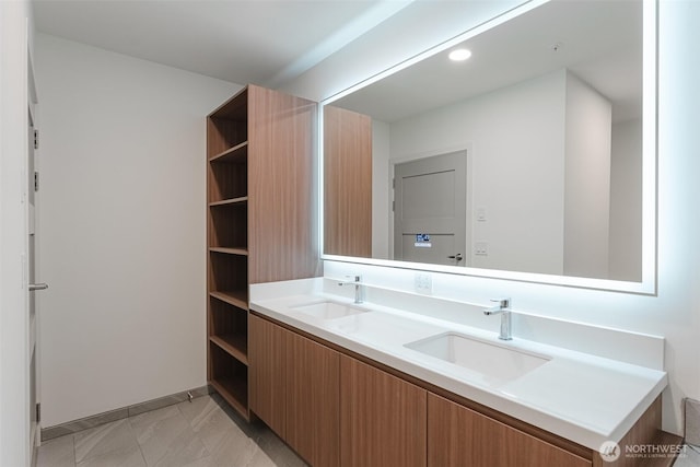 bathroom with double vanity and a sink