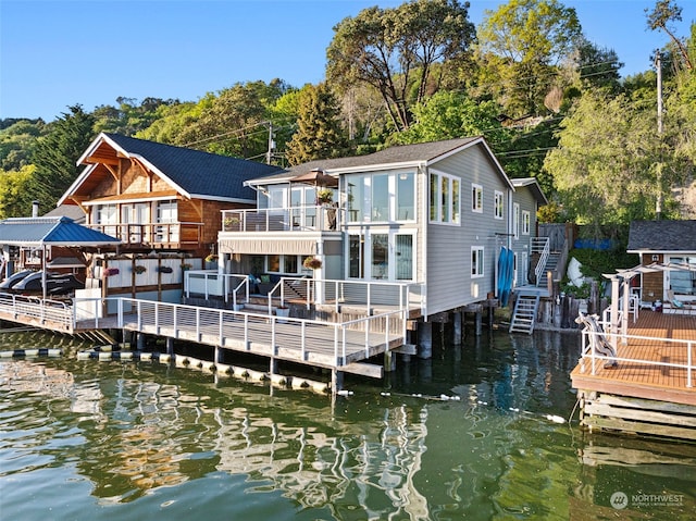 dock area with a deck with water view