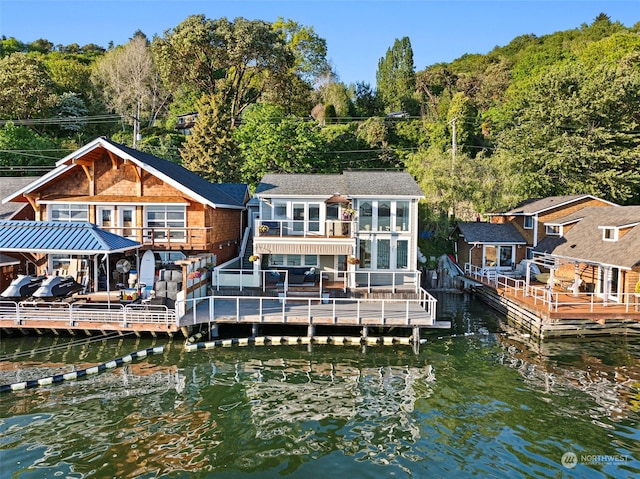 back of house featuring a water view