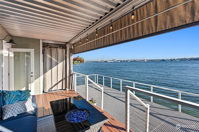 dock area featuring a water view