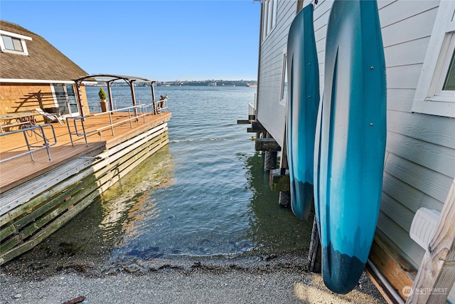 view of dock with a water view