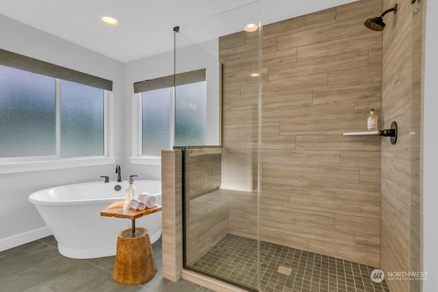 bathroom with tile patterned flooring and plus walk in shower