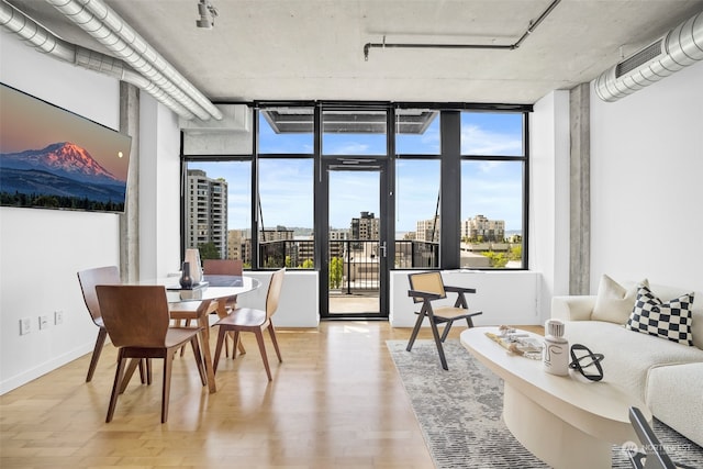 sunroom / solarium with a view of city