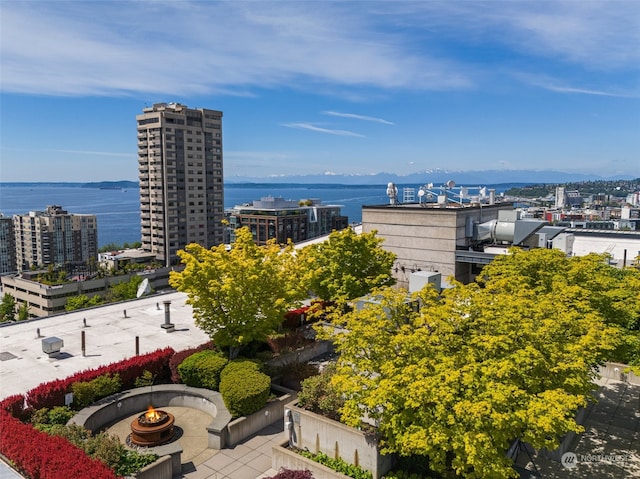 property's view of city featuring a water view