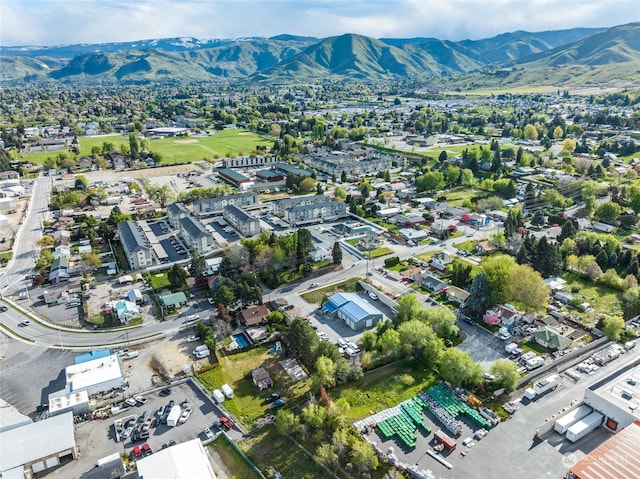 drone / aerial view featuring a mountain view