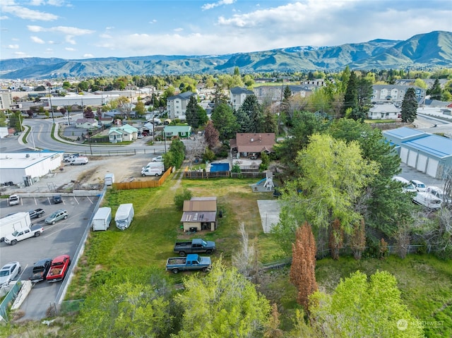 drone / aerial view featuring a mountain view