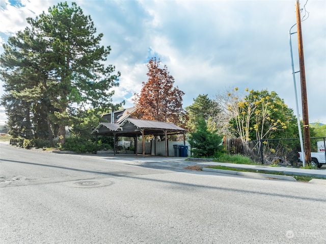 view of front facade with a carport