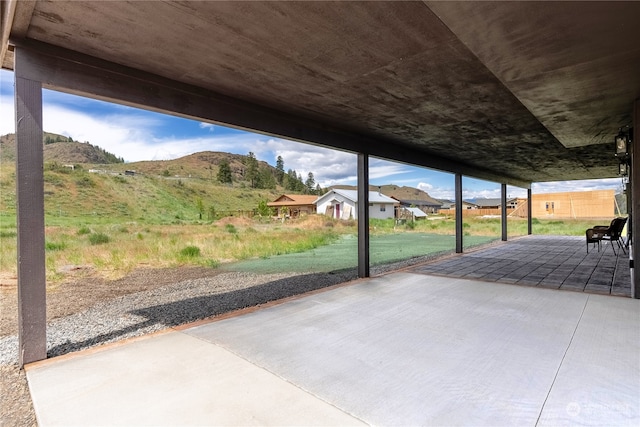 view of terrace with a mountain view