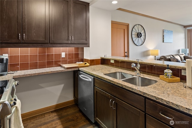 kitchen featuring dark hardwood / wood-style floors, backsplash, dark brown cabinets, stainless steel dishwasher, and sink