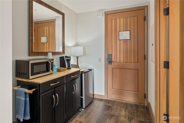 kitchen with dark hardwood / wood-style floors