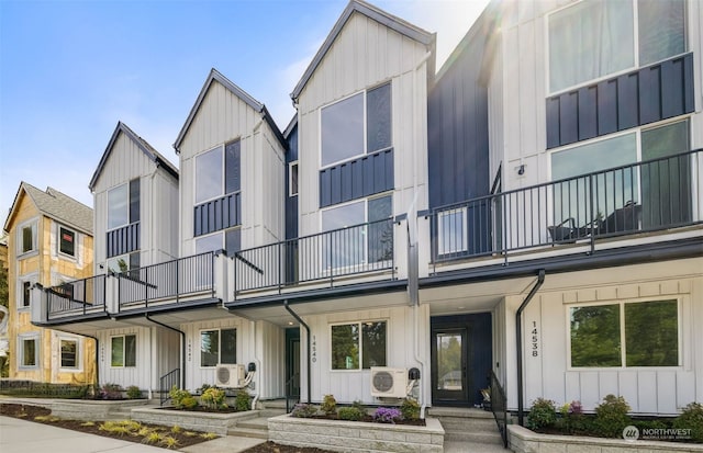 exterior space featuring ac unit and a balcony