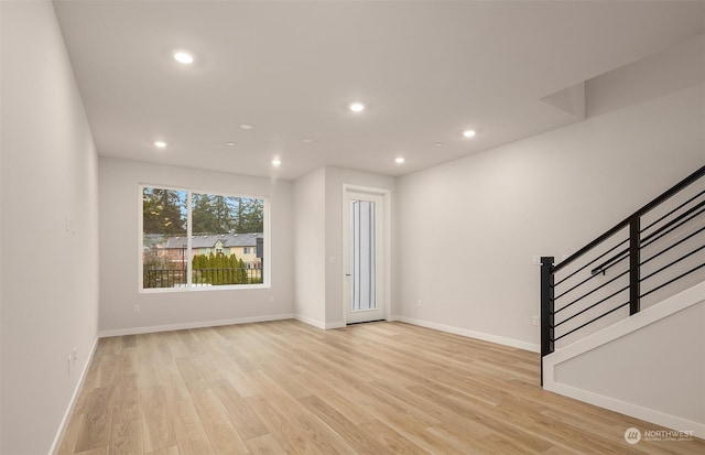 unfurnished room featuring light hardwood / wood-style flooring