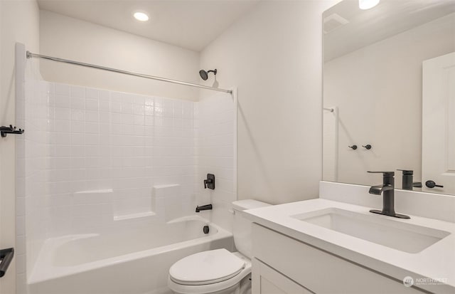 full bathroom with vanity, shower / bathtub combination, and toilet