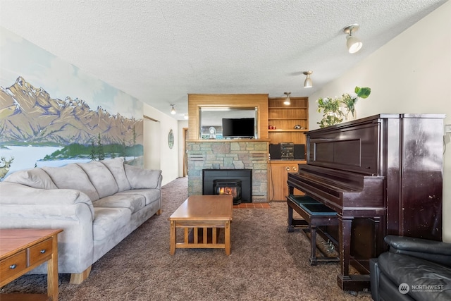 513 Cleveland Ave, South Cle Elum, WA 98943 - living room with dark carpet, a textured ceiling, and a fireplace