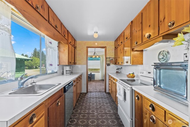 513 Cleveland Ave, South Cle Elum, WA 98943 - kitchen featuring stainless steel dishwasher, electric stove, backsplash, sink, and dark tile floors