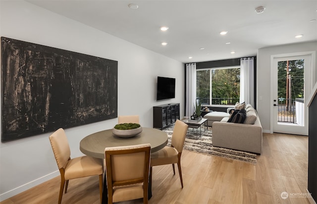 dining room featuring light hardwood / wood-style floors