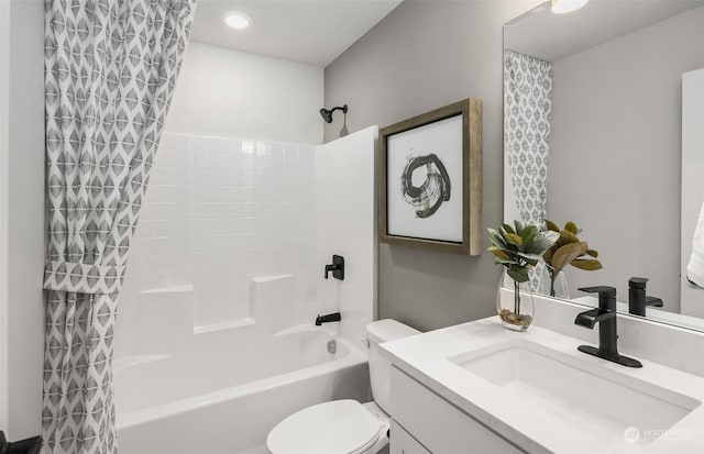 full bathroom with shower / tub combo with curtain, oversized vanity, and toilet