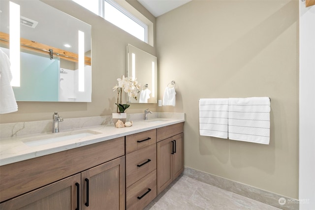 bathroom featuring tile flooring and double sink vanity