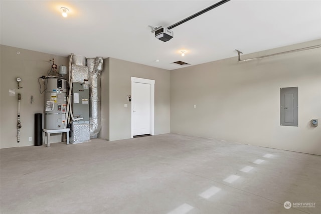 garage featuring secured water heater, heating utilities, and a garage door opener