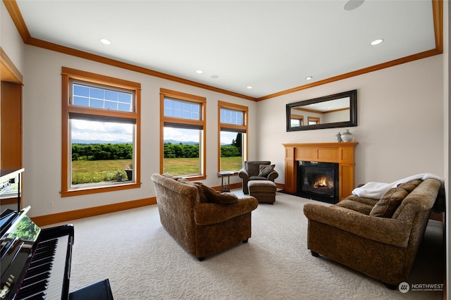 carpeted living room featuring crown molding and a wealth of natural light