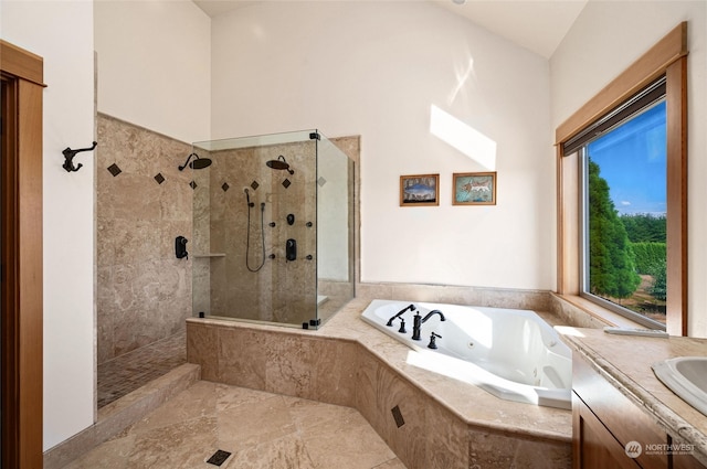 bathroom featuring high vaulted ceiling, independent shower and bath, vanity, and tile flooring