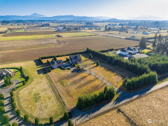 bird's eye view with a mountain view and a rural view