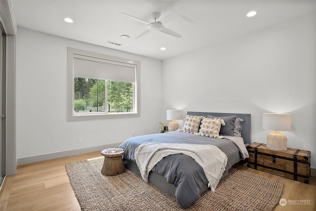 bedroom featuring ceiling fan and light wood-type flooring