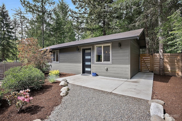 ranch-style home featuring a patio