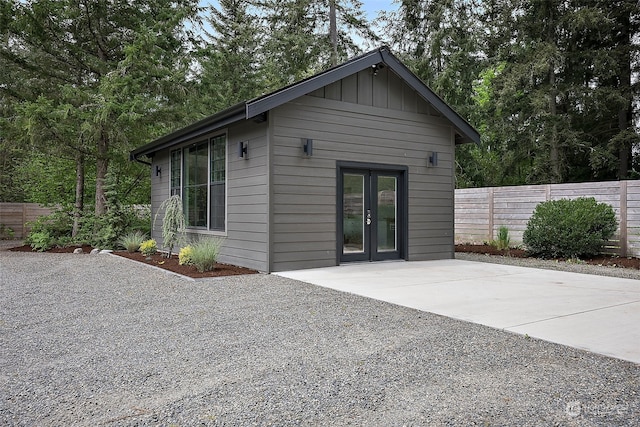 back of house with a patio and french doors