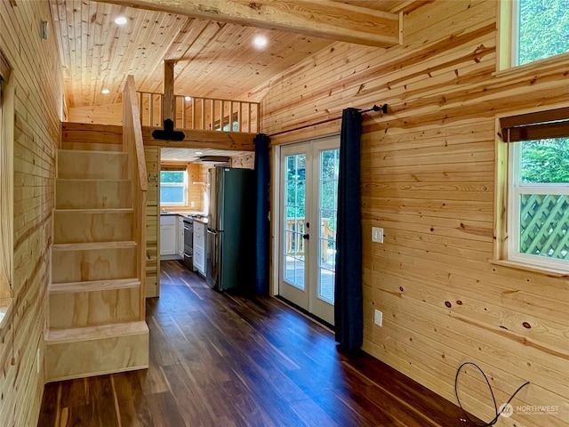 interior space featuring a healthy amount of sunlight, wood-type flooring, and wooden ceiling