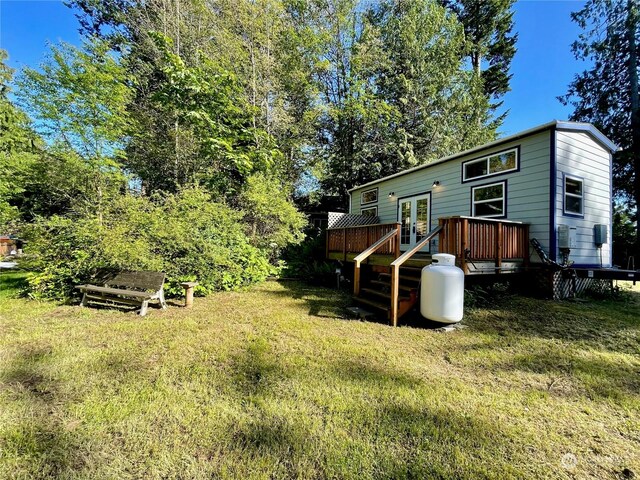 view of yard with a deck