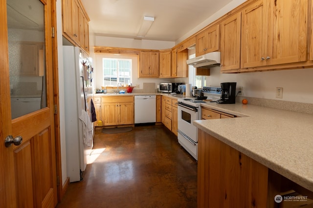 kitchen with sink and white appliances