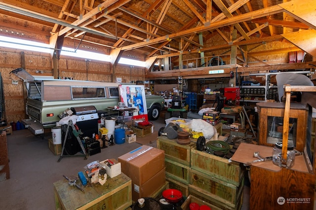 garage with a workshop area