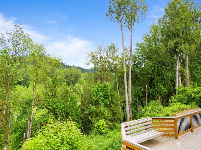 view of property's community with a wooden deck