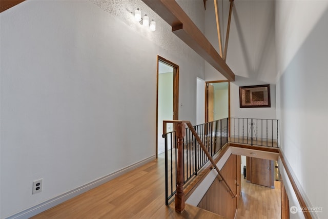 stairway featuring light hardwood / wood-style flooring