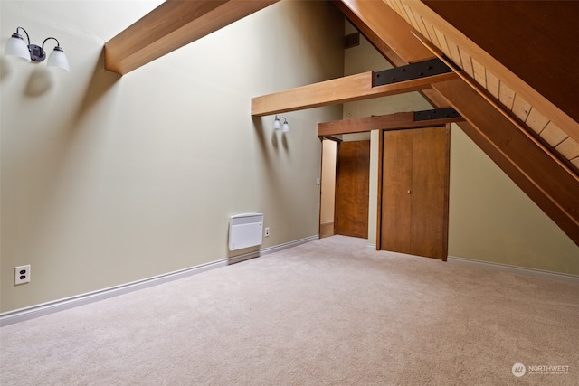 bonus room with carpet flooring