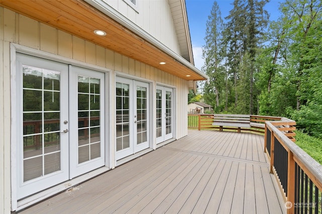 wooden terrace featuring french doors