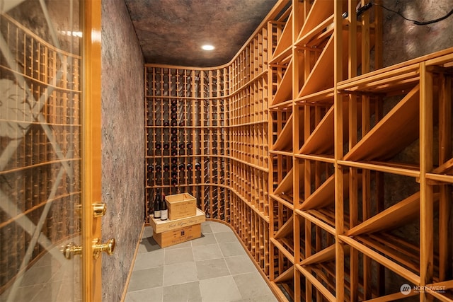 wine room featuring tile floors