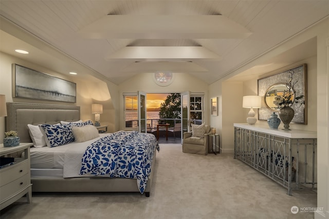 bedroom with vaulted ceiling, light carpet, and access to outside