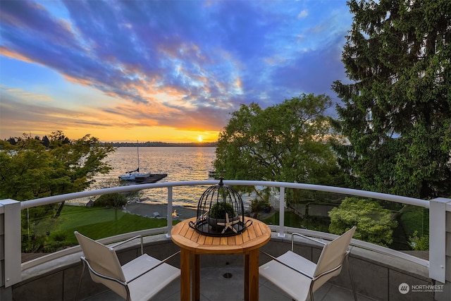 deck at dusk with a water view