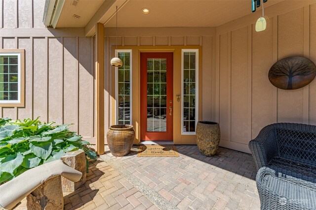 property entrance featuring a patio