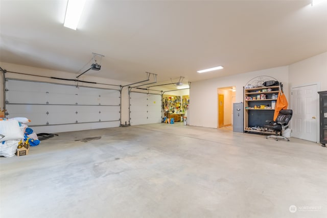 garage featuring a garage door opener