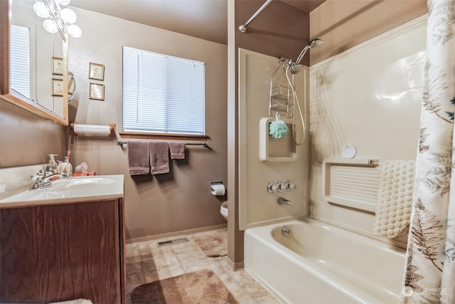 full bathroom with tile flooring, shower / tub combo with curtain, a healthy amount of sunlight, vanity, and toilet