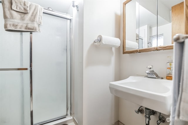 bathroom with an enclosed shower