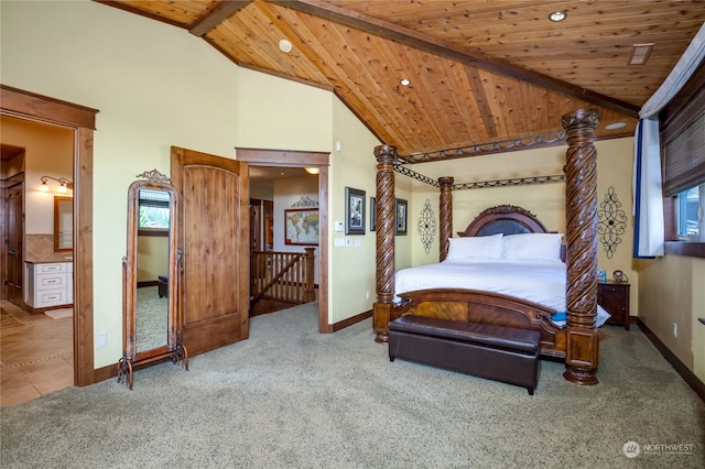 carpeted bedroom with multiple windows, connected bathroom, vaulted ceiling with beams, and wood ceiling