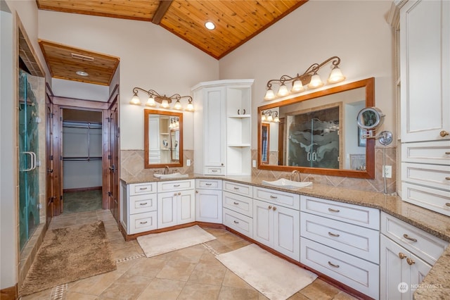 bathroom featuring beamed ceiling, tile patterned flooring, vanity, an enclosed shower, and wood ceiling